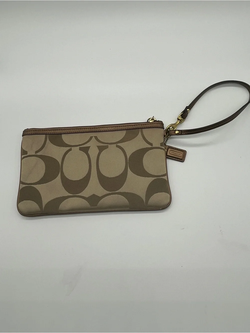 Coach Signature Logo khaki canvas and leather wristlet with 3D flower appliqué